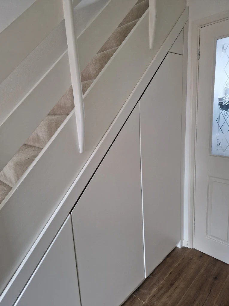 Bespoke staircase and under-stairs storage joinery by D.K. Carpentry